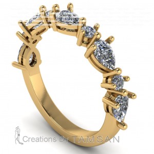 Diamond Pear and Round East West Anniversary Ring 1Ctw
