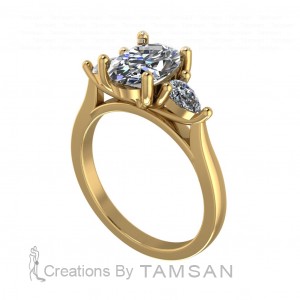 Three Stone Oval and Pear Engagement Ring